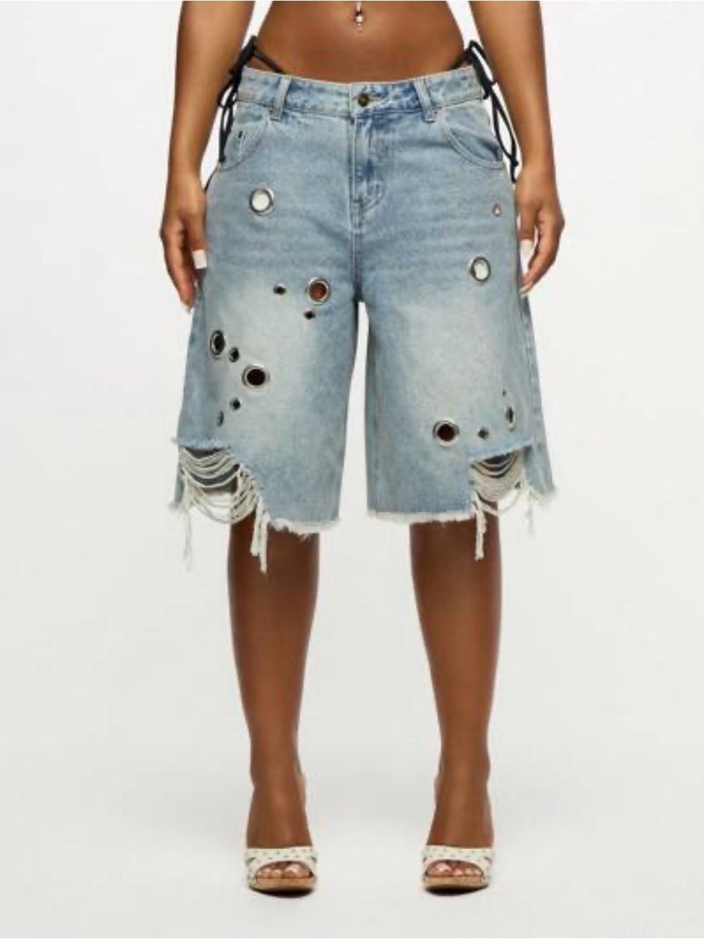Distressed Light Blue Denim Cut-Off Shorts with Grommet Details